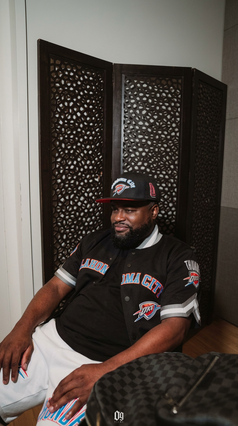 OCity HAZZ seated in Oklahoma City Thunder apparel